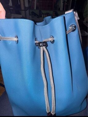 Lacoste Blue Drawstring Shoulder Bucket Bag with Silver Accents